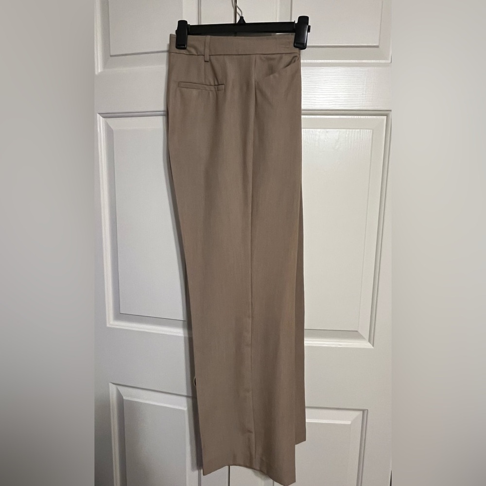 Women’s Kim Roger’s slacks in tan size 14.